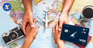 Cartão CAIXA Ícone Visa Infinite em cenário de viagem
